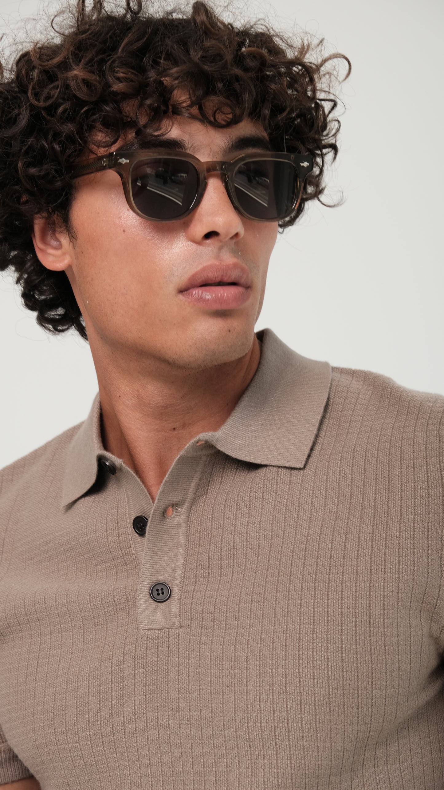 a person wearing Bardovano sunglasses, showcasing the sleek design and modern style.