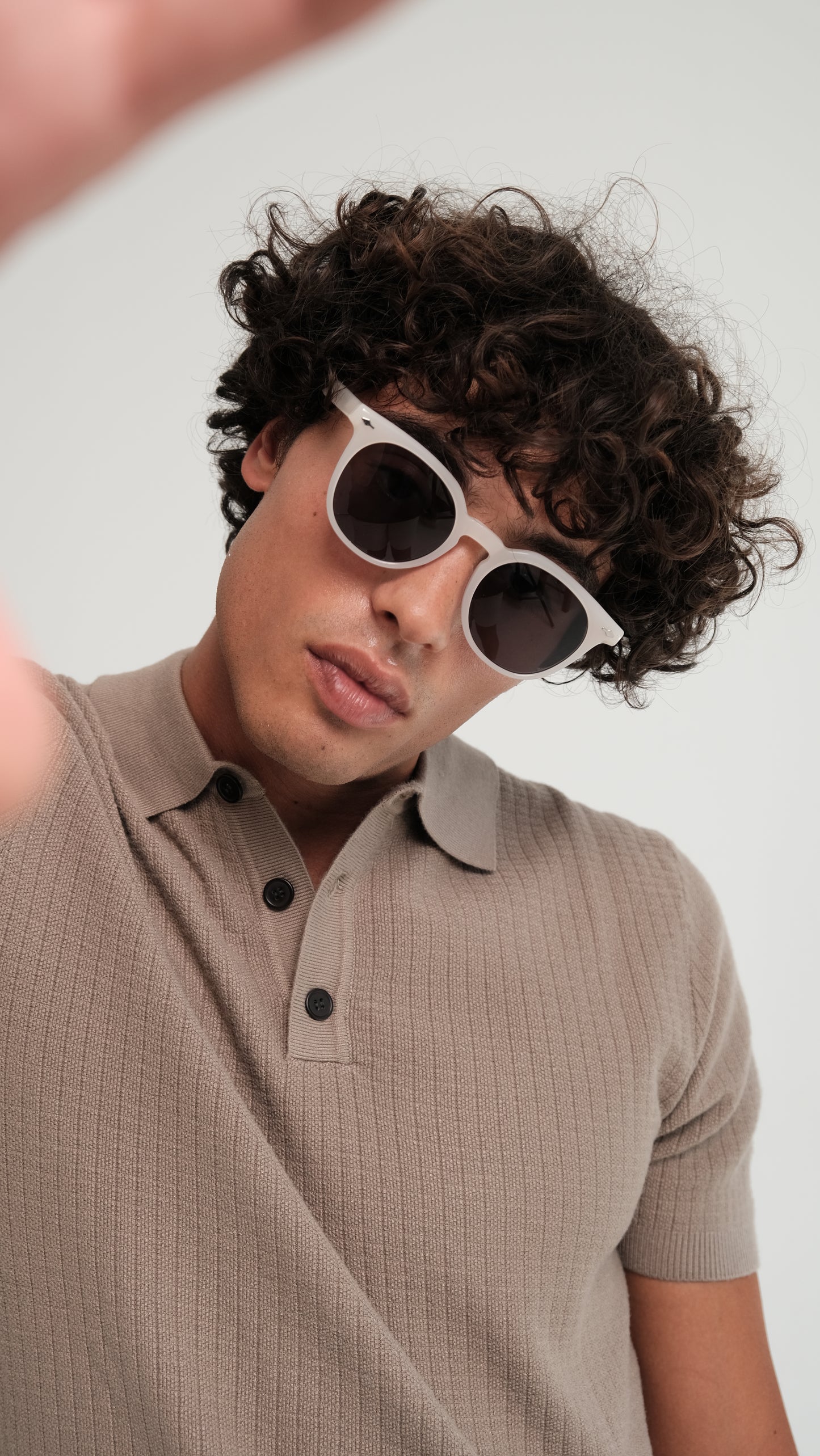 a person wearing Bardovano sunglasses, showcasing the sleek design and modern style.