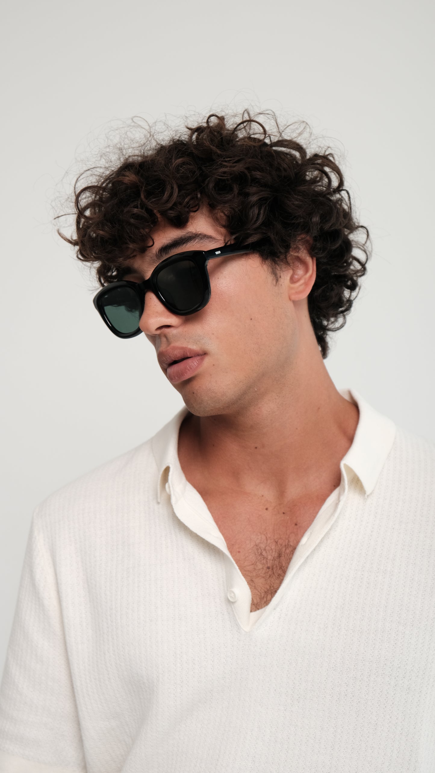 a person wearing Bardovano sunglasses, showcasing the sleek design and modern style.