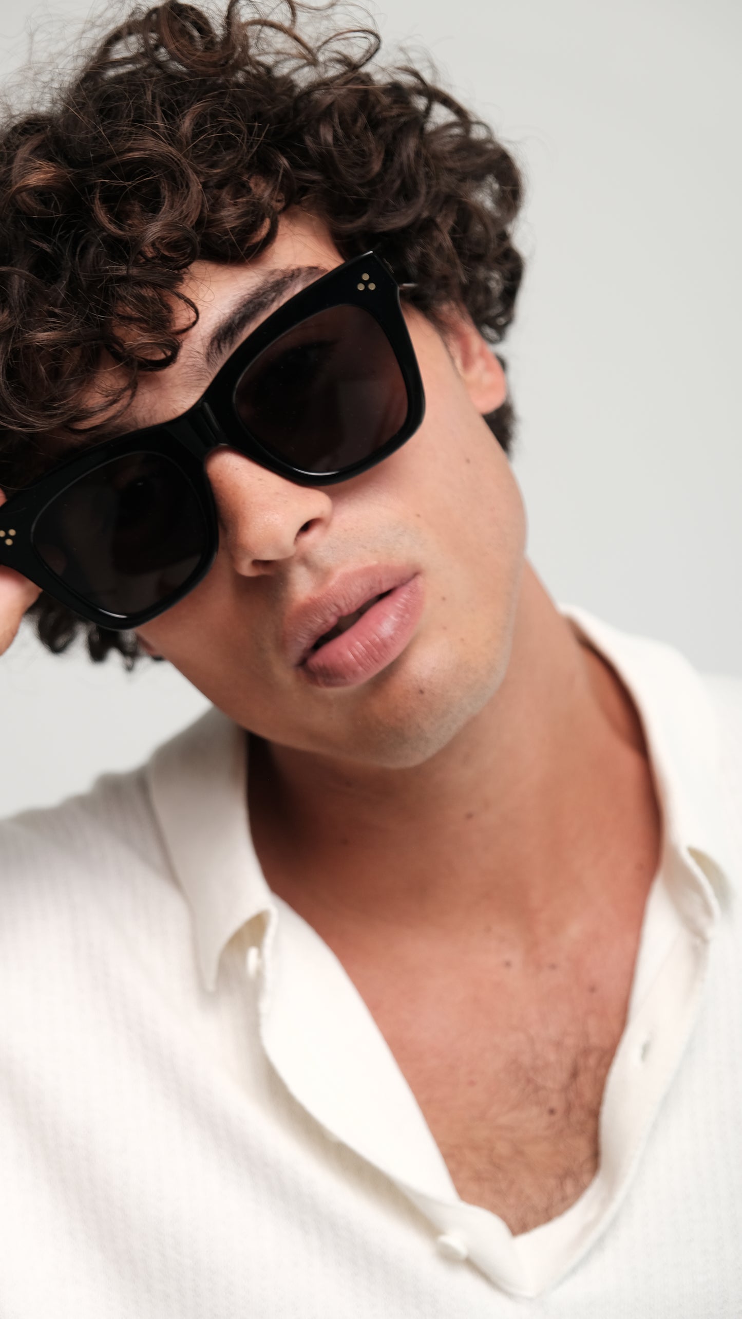 a person wearing Bardovano sunglasses, showcasing the sleek design and modern style.