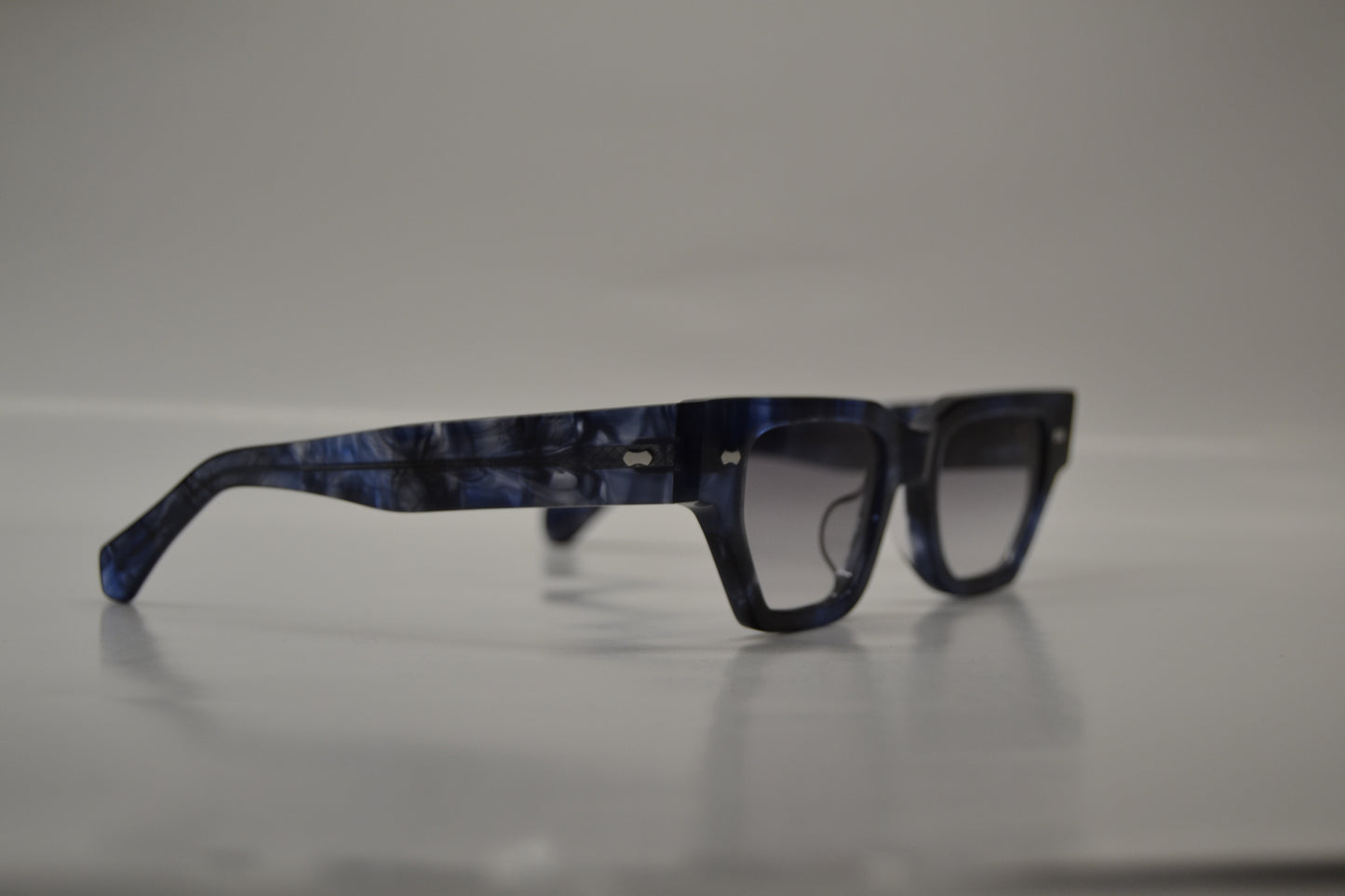 A pair of Bardovano sunglasses with polarized lenses, side view