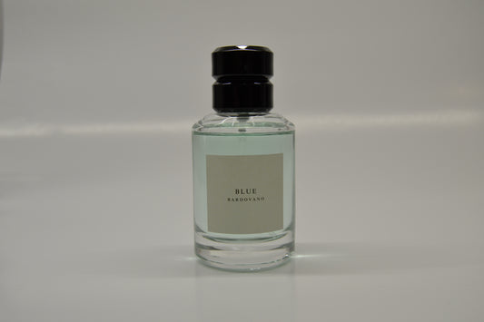 Clear bottle with black cap on a gray background and the name blue