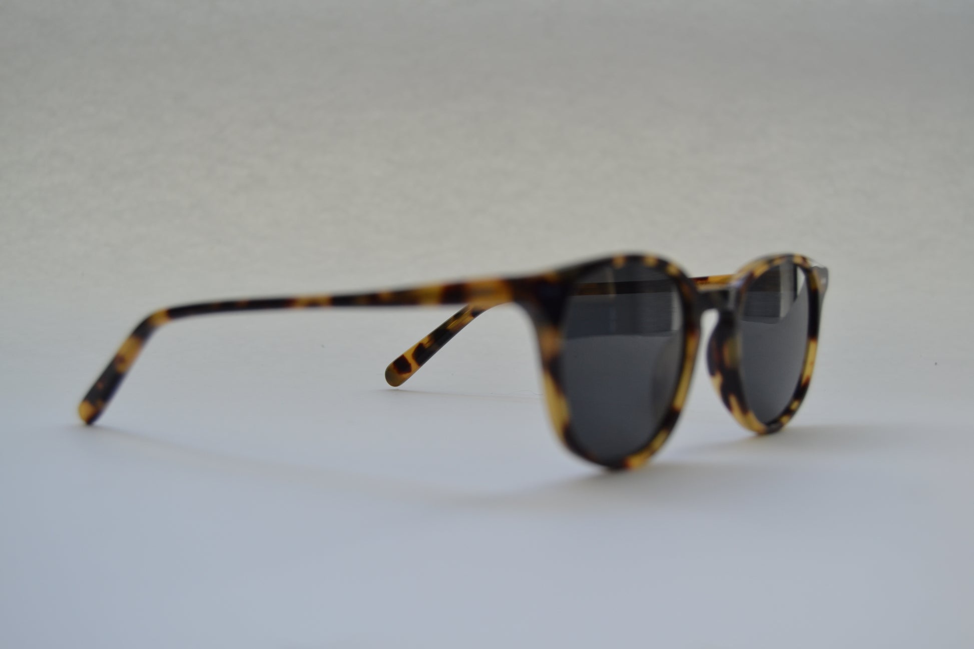 A pair of Bardovano sunglasses with polarized and UV lenses, side view